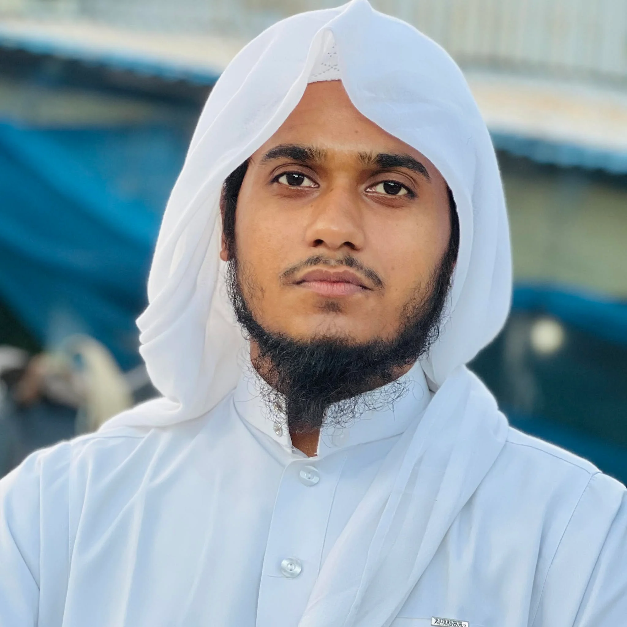 Saiful Islam in traditional Arabian attire